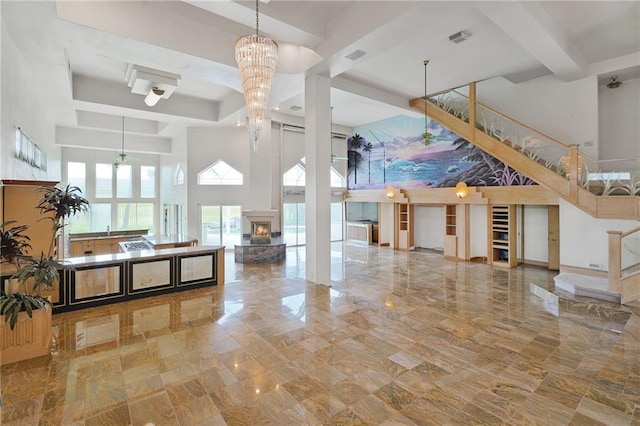 3128 Palm Vista Dr, Metairie, LA 70003 - common area with a towering ceiling and stairway