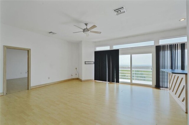 3128 Palm Vista Dr, Metairie, LA 70003 - unfurnished room with light wood-style flooring, a ceiling fan, and recessed lighting