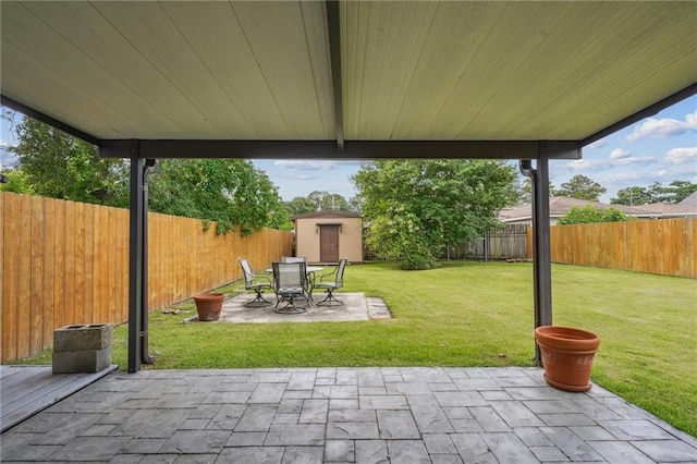 4808 Fairfield St, Metairie, LA 70006 - fenced backyard with a shed, a patio area, and outdoor dining area