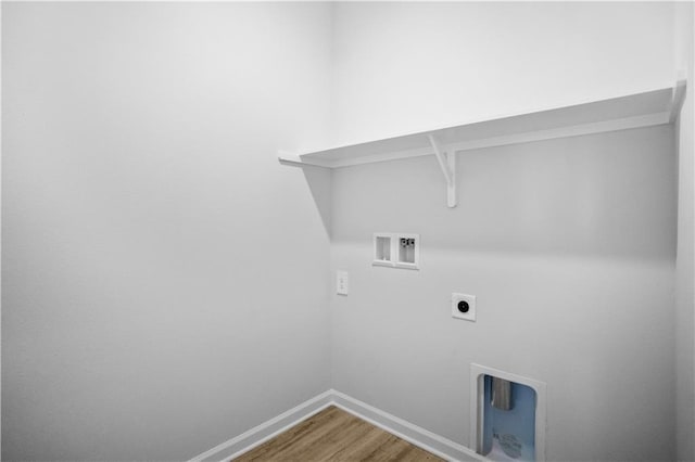 40447 Cara Mae St, Slidell, LA 70461 - laundry area featuring washer hookup, wood finished floors, and hookup for an electric dryer