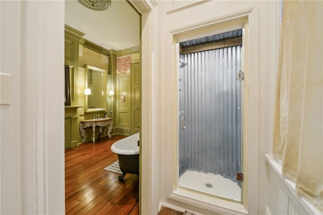 818 Lafayette St Unit 818, New Orleans, LA 70113 - bathroom with hardwood / wood-style flooring and a shower stall