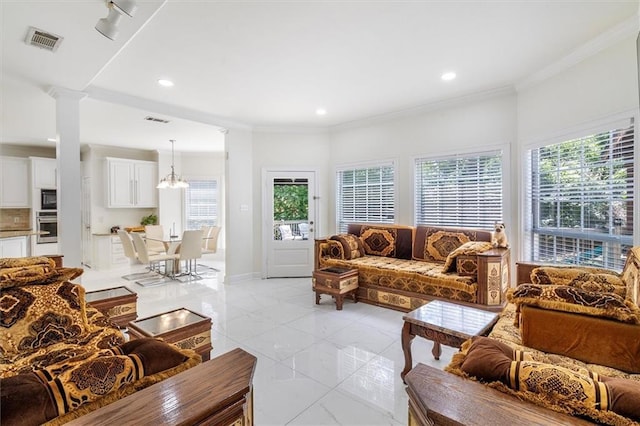 647 Highland Oaks Dr, Baton Rouge, LA 70810 - living room featuring ornamental molding, recessed lighting, ornate columns, and a chandelier