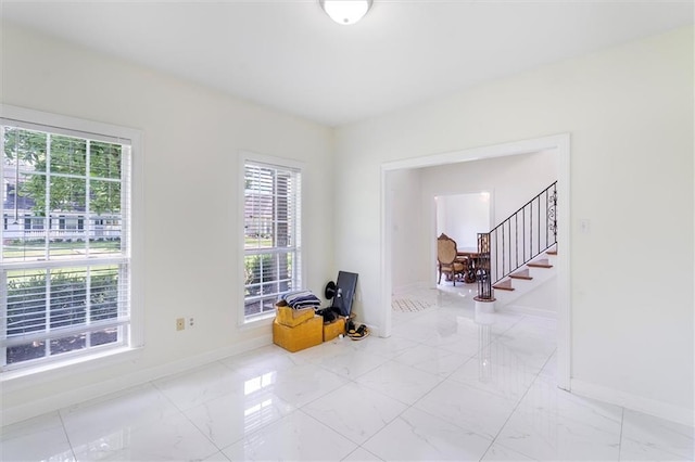647 Highland Oaks Dr, Baton Rouge, LA 70810 - unfurnished room with marble finish flooring and stairway