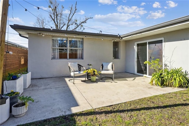 525 Bellview St, River Ridge, LA 70123 - rear view of property with stucco siding and a patio