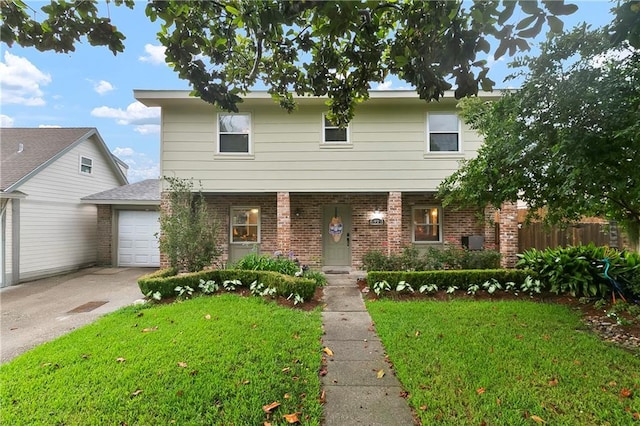 5921 Rickey St, Metairie, LA 70003 - view of front facade featuring brick siding, concrete driveway, and an attached garage