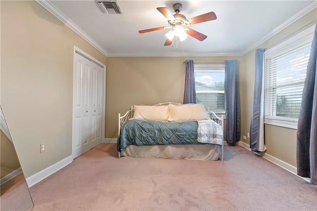 5921 Rickey St, Metairie, LA 70003 - bedroom featuring carpet, crown molding, a closet, and ceiling fan