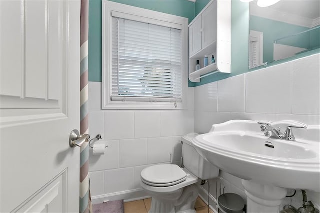 5921 Rickey St, Metairie, LA 70003 - full bath with tile walls, tile patterned flooring, and a shower