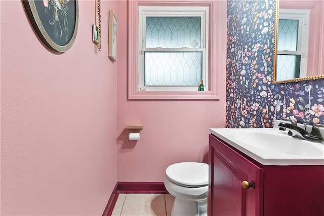 5921 Rickey St, Metairie, LA 70003 - half bathroom featuring vanity, tile patterned flooring, and wallpapered walls