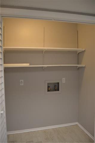 222 Putters Ln Unit 39, Slidell, LA 70460 - laundry area featuring washer hookup and baseboards