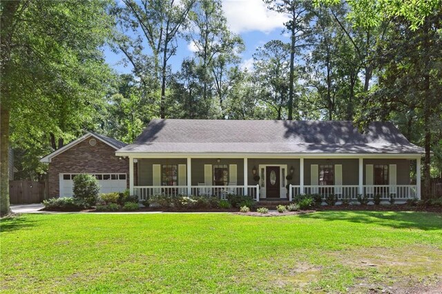 103 Century Oaks Ln, Mandeville, LA 70471 - view of front of property featuring covered porch and a garage
