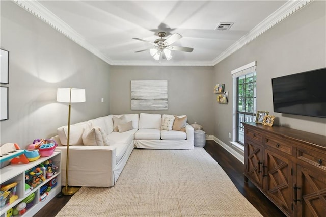 103 Century Oaks Ln, Mandeville, LA 70471 - living room featuring crown molding, ceiling fan, and dark wood-type flooring