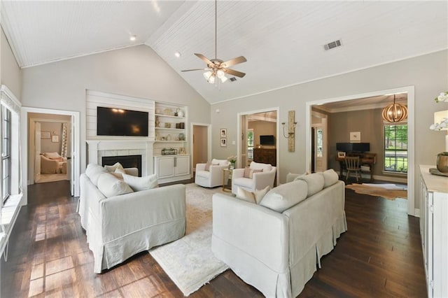 103 Century Oaks Ln, Mandeville, LA 70471 - living room with high vaulted ceiling, a fireplace, dark wood-style flooring, and a ceiling fan