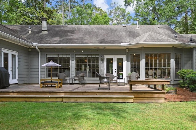 103 Century Oaks Ln, Mandeville, LA 70471 - rear view of property with a yard, roof with shingles, a deck, and french doors
