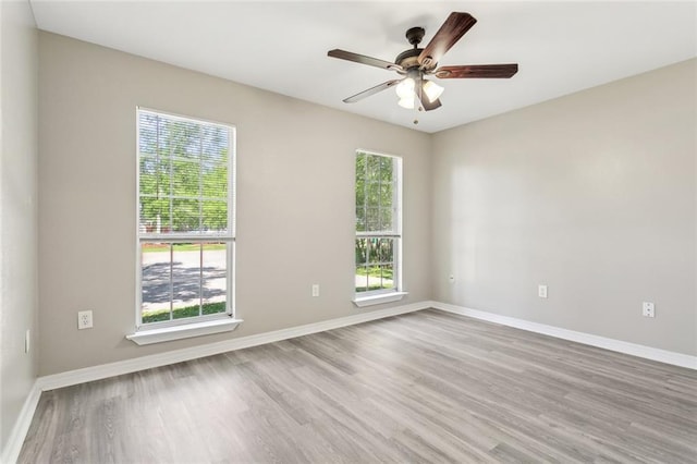 3298 Rama St, Slidell, LA 70458 - spare room with wood finished floors and a ceiling fan