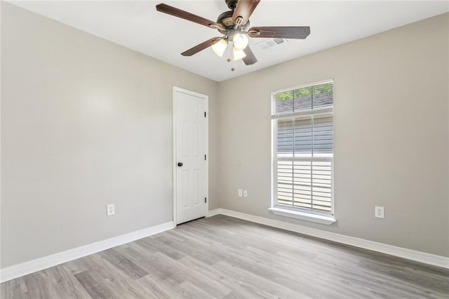3298 Rama St, Slidell, LA 70458 - empty room with a ceiling fan and light wood-style flooring