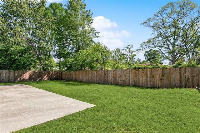 3298 Rama St, Slidell, LA 70458 - fenced backyard with a patio area