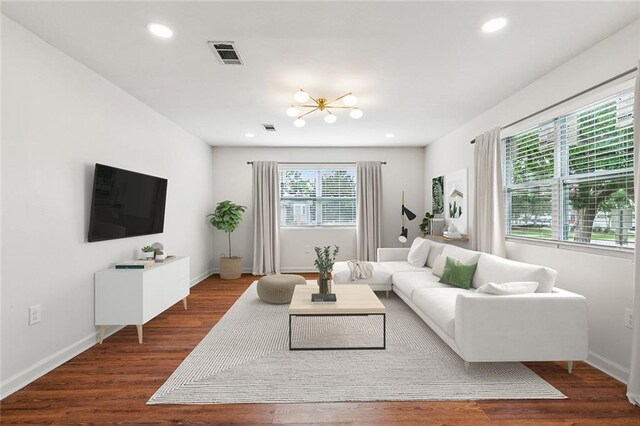 802 Claiborne Dr, Jefferson, LA 70121 - living area featuring a chandelier, wood finished floors, and recessed lighting