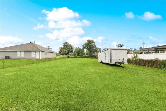 413 Fir St, La Place, LA 70068 - view of yard featuring a storage unit