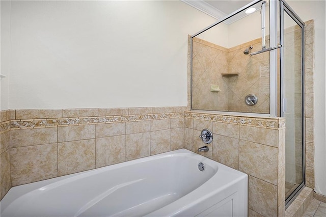 8000 Stonelake Village Ave Unit 406, Baton Rouge, LA 70820 - bathroom featuring a stall shower, a garden tub, and ornamental molding