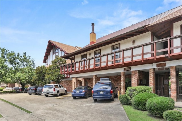 2305 Cleary Ave Unit 225, Metairie, LA 70001 - view of building exterior featuring uncovered parking