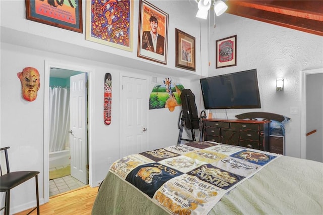 2305 Cleary Ave Unit 225, Metairie, LA 70001 - bedroom with wood finished floors and ensuite bathroom