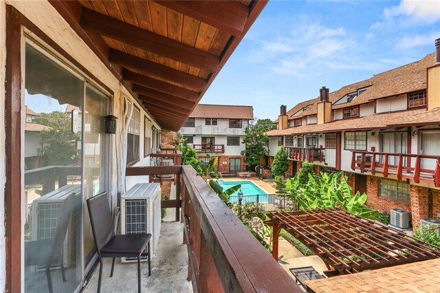 2305 Cleary Ave Unit 225, Metairie, LA 70001 - balcony with view of pool area and a residential view