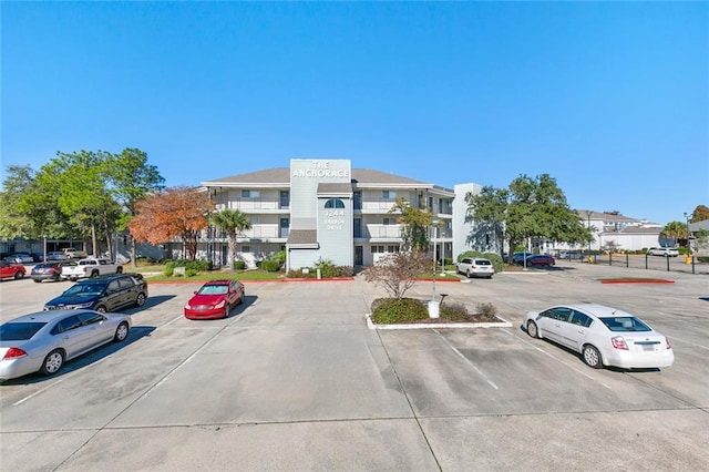 1244 Harbor Dr Unit 321, Slidell, LA 70458 - view of building exterior with uncovered parking