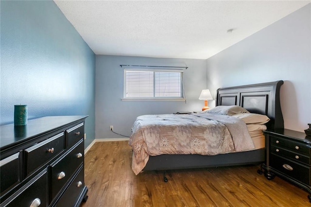 1244 Harbor Dr Unit 321, Slidell, LA 70458 - bedroom with wood finished floors and baseboards