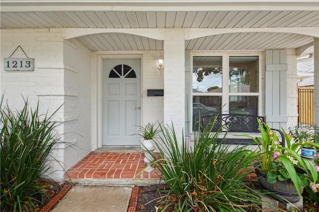 1213 Focis St, Metairie, LA 70005 - entrance to property featuring brick siding and a porch