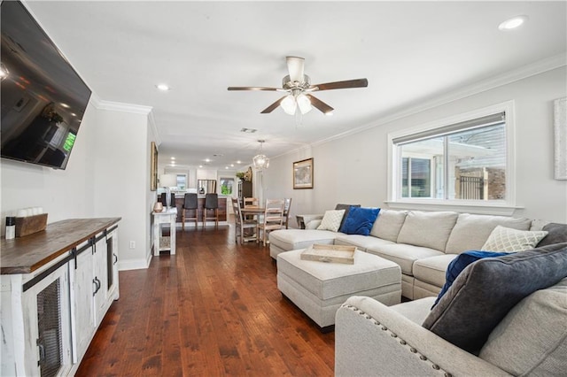 1213 Focis St, Metairie, LA 70005 - living area featuring beverage cooler, ceiling fan, healthy amount of natural light, dark wood finished floors, and ornamental molding
