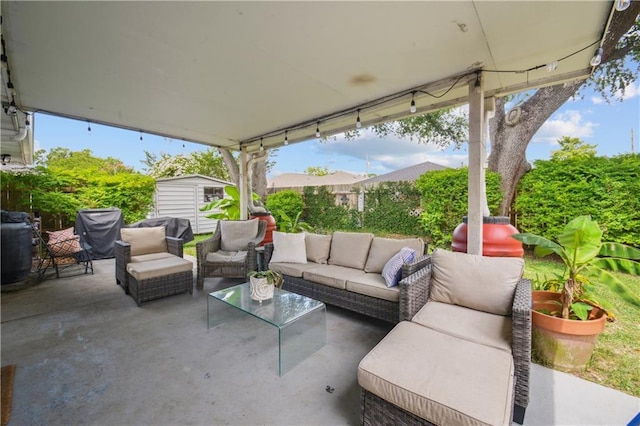 1213 Focis St, Metairie, LA 70005 - view of patio / terrace featuring outdoor lounge area and a storage shed
