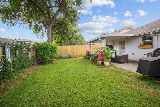 1213 Focis St, Metairie, LA 70005 - fenced backyard featuring a patio area and outdoor lounge area