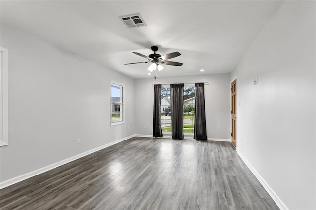 42 Tulip Dr, Gretna, LA 70053 - empty room with a ceiling fan, dark wood-style flooring, and recessed lighting