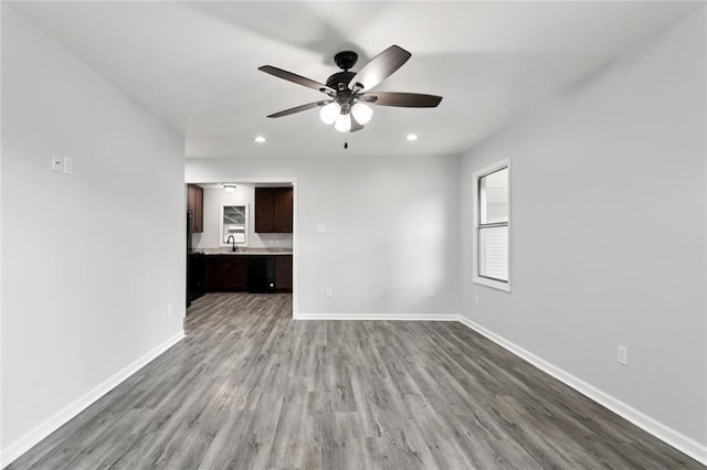 42 Tulip Dr, Gretna, LA 70053 - unfurnished living room featuring ceiling fan, wood finished floors, and recessed lighting