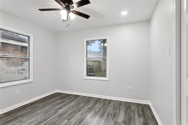 42 Tulip Dr, Gretna, LA 70053 - unfurnished room with dark wood-style floors, ceiling fan, and recessed lighting