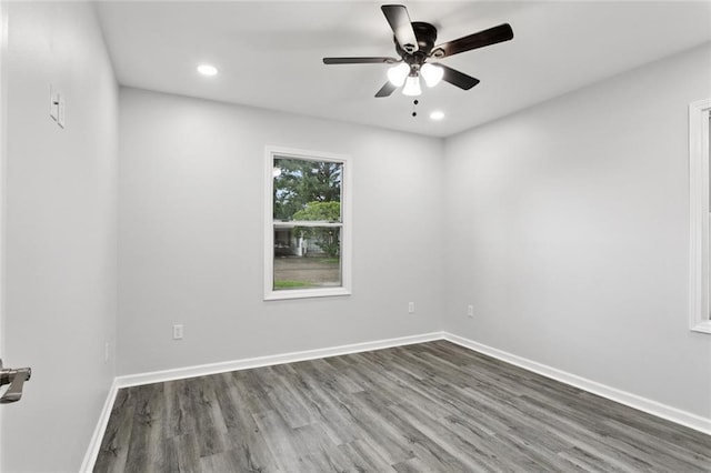 42 Tulip Dr, Gretna, LA 70053 - empty room with dark wood finished floors, ceiling fan, and recessed lighting