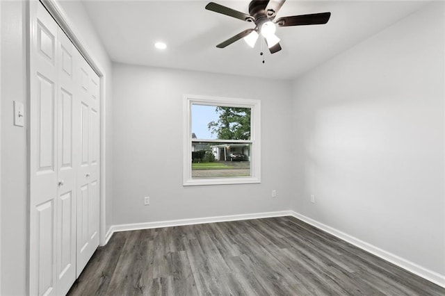 42 Tulip Dr, Gretna, LA 70053 - unfurnished bedroom featuring a closet, dark wood-style flooring, recessed lighting, and ceiling fan