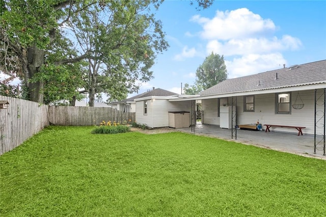 42 Tulip Dr, Gretna, LA 70053 - fenced backyard with a patio area