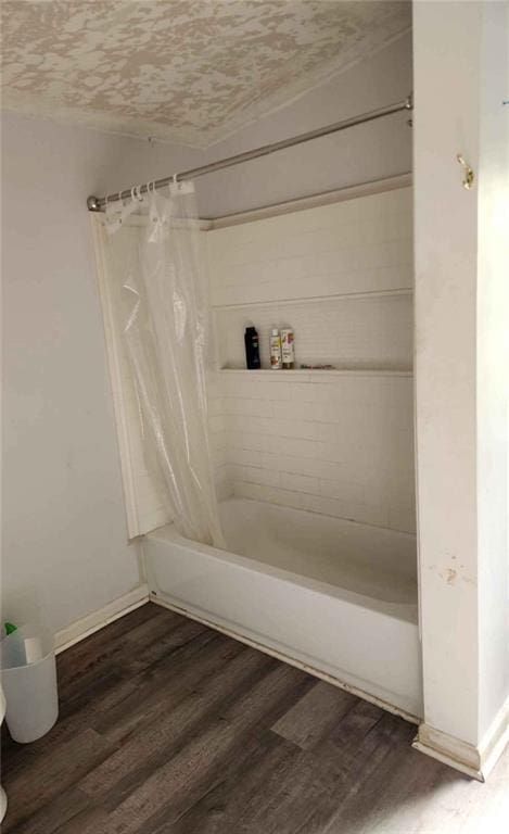 116 Cedar Dr, Belle Chasse, LA 70037 - full bath with shower / bath combo with shower curtain and wood finished floors