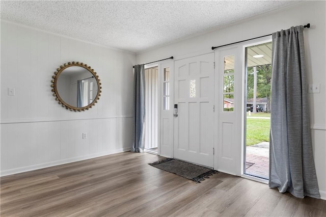 109 Sherry Dr, Hammond, LA 70401 - entryway with wood finished floors and a textured ceiling