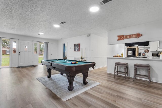 109 Sherry Dr, Hammond, LA 70401 - recreation room with a textured ceiling, pool table, light wood-type flooring, and recessed lighting