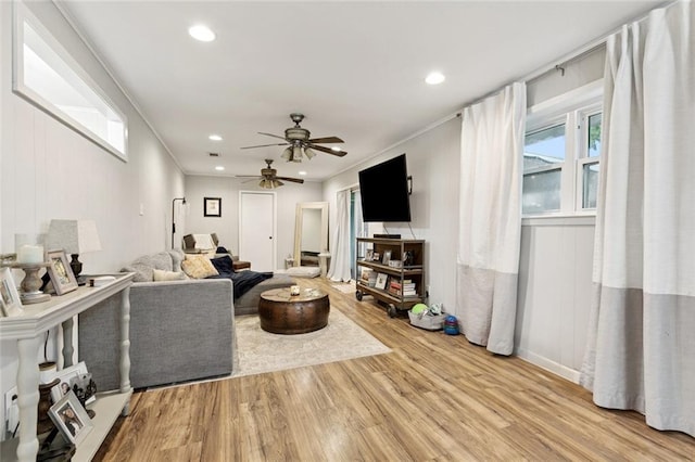 917 Ellen St, Terrytown, LA 70056 - living area featuring wood finished floors, ceiling fan, recessed lighting, and crown molding