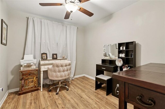 917 Ellen St, Terrytown, LA 70056 - office space featuring light wood-style flooring and a ceiling fan