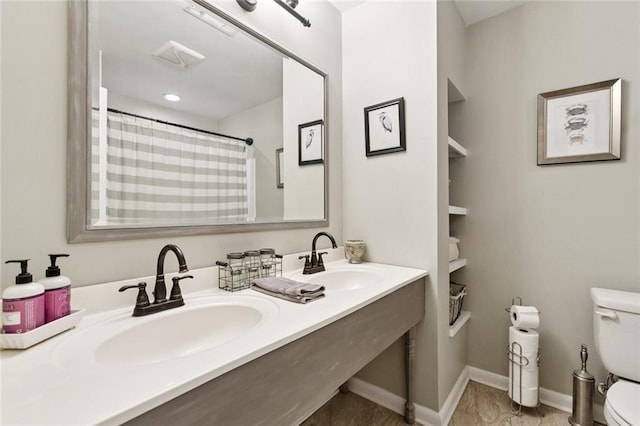 917 Ellen St, Terrytown, LA 70056 - bathroom featuring double vanity and a shower with shower curtain
