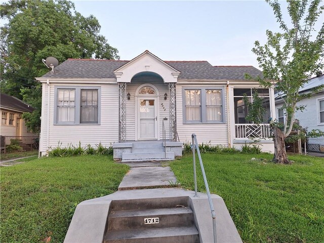 4712 Lafaye St, New Orleans, LA 70122 - view of front of house featuring a shingled roof