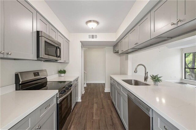 34 Chamale Cv Unit 34, Slidell, LA 70460 - kitchen with stainless steel appliances and gray cabinetry