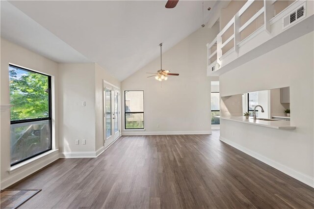 34 Chamale Cv Unit 34, Slidell, LA 70460 - unfurnished living room with a ceiling fan, dark wood-type flooring, and high vaulted ceiling