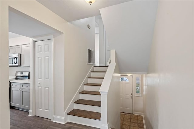 34 Chamale Cv Unit 34, Slidell, LA 70460 - stairs featuring baseboards and wood finished floors