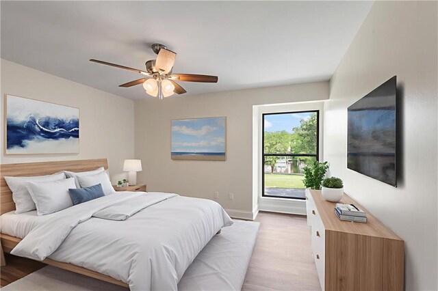 34 Chamale Cv Unit 34, Slidell, LA 70460 - bedroom with light wood finished floors and a ceiling fan