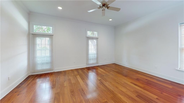 3739 N Hullen St, Metairie, LA 70002 - empty room with plenty of natural light, a ceiling fan, ornamental molding, wood finished floors, and recessed lighting